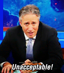 Gif of Jon Stewart gesturing emphatically, with overlaid text that says "Unacceptable."