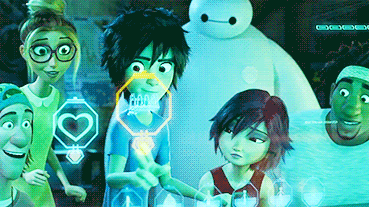 Hiro from Disney's Big Hero 6 showing his friends how to bring technology to a big screen