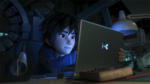 Hiro from Disney&#x27;s Big Hero 6 touching up Baymax design on a tablet
