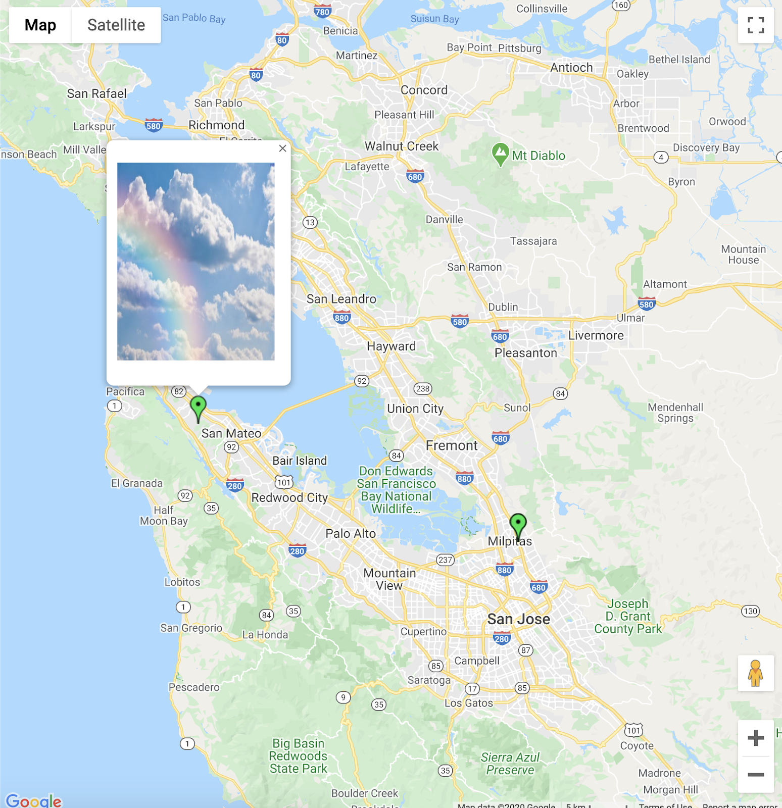 screenshot of Google Maps with a pinpoint and picture of a sky on that pinpoint