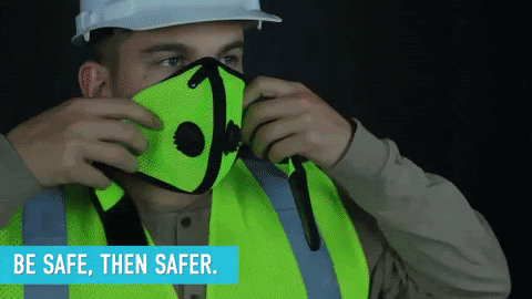 animated gif of a worker putting on safety gear. Caption is "be safe, then safer"