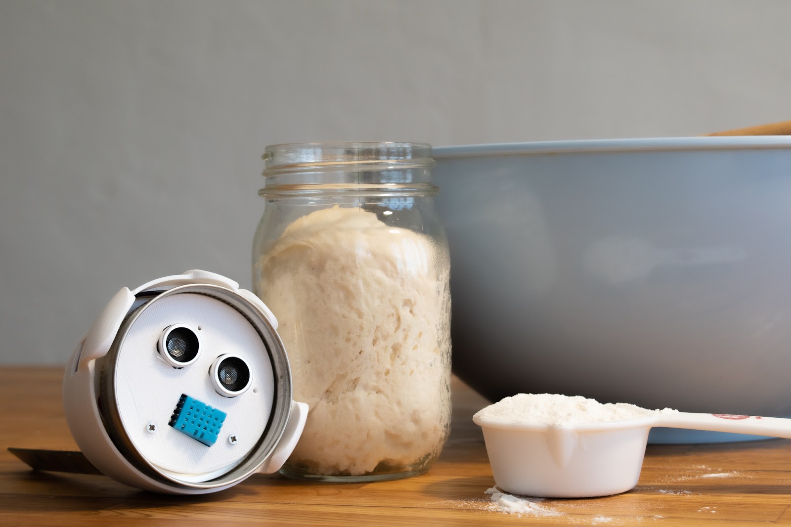 The underside of the sourd.io sourdough starter monitor, which has a temperature/humidity sensor and an ultrasonic distance sensor