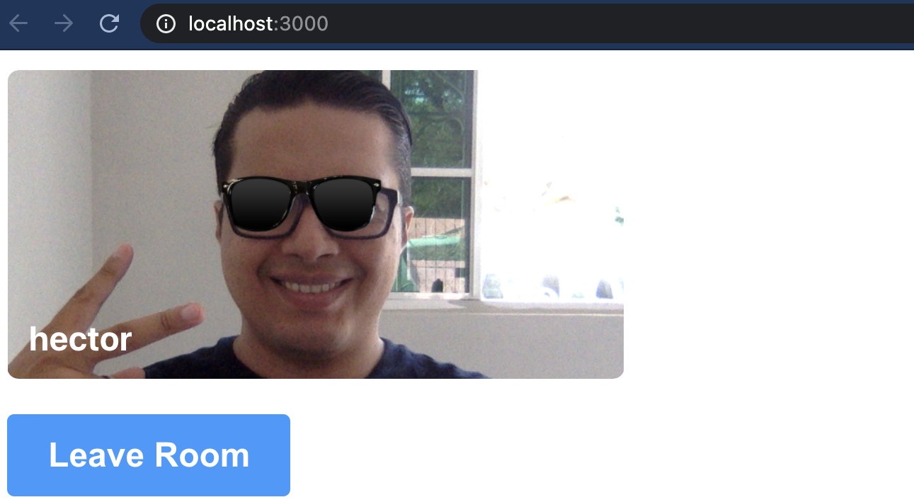Browser pointing to localhost:3000 with an image of the author, "hector", smiling with a sunglasses filter over his eyes.