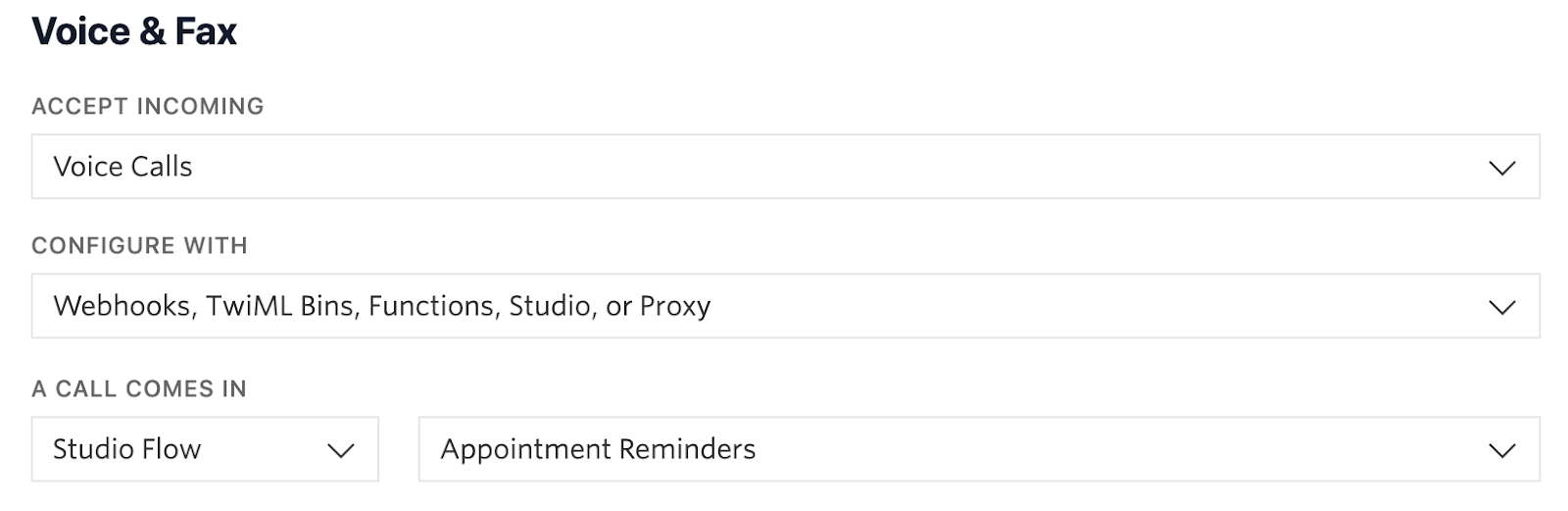 Screenshot of the Twilio phone numbers console Voice section with the Studio flow "Appointment Reminders" selected