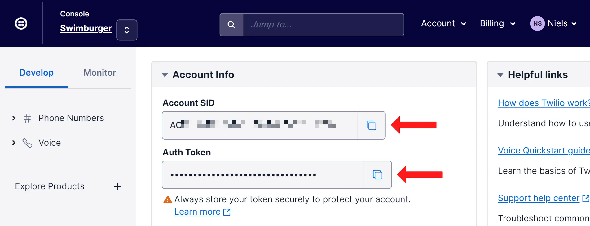 Twilio account dashboard with the Account SID and the Auth Token is pointed out by arrows.
