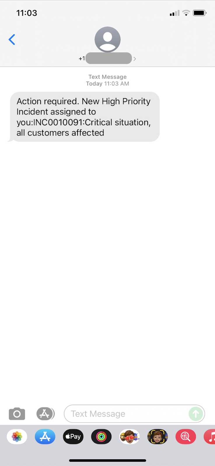 A screenshot of the SMS message sent by ServiceNow Notify