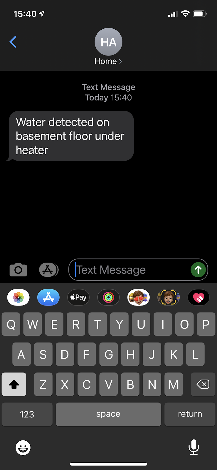 example text message sent to your phone saying "Water detected on basement floor under heater"