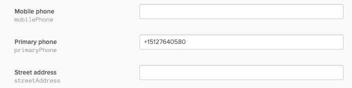 Setting the phone number attribute on the Okta user.