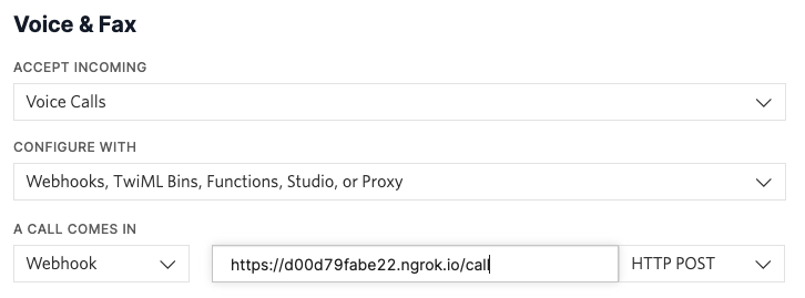 Screenshot showing webhook configuration for twilio phone number