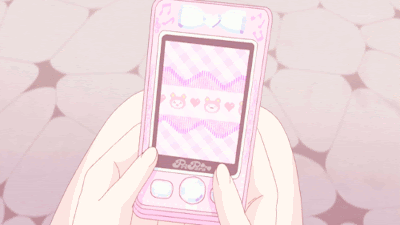gif of pink anime cell phone with bunnies