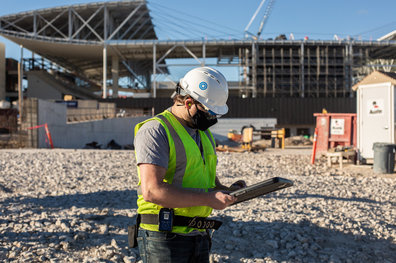 Worker wearing a BlueCats tracker