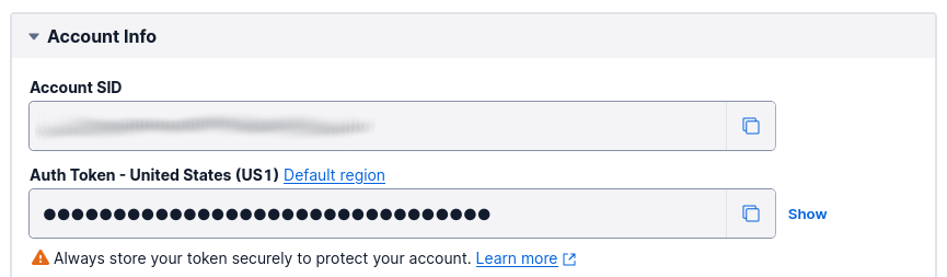 Project Info section in the Twilio Console dashboard with two read-only fields: ACCOUNT SID and AUTH TOKEN.nd account SID