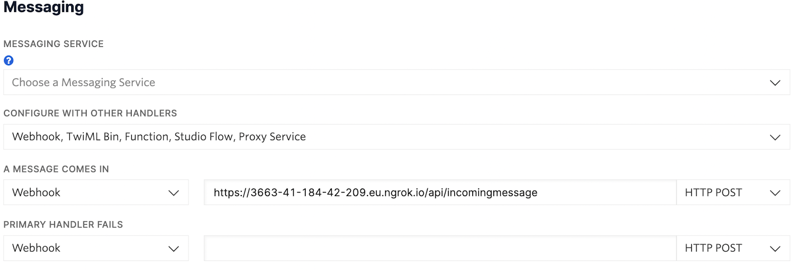 Twilio Phone Number Messaging section where you can configure the webhook URL for incoming messages.