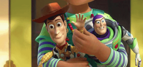 GIF of woody from toy story waving