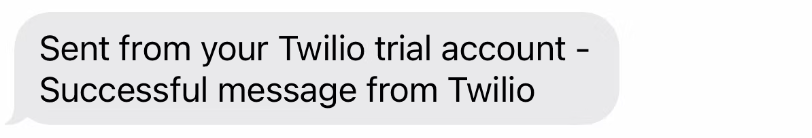 Screenshot showing an SMS for of successful deployment message from Twilio,