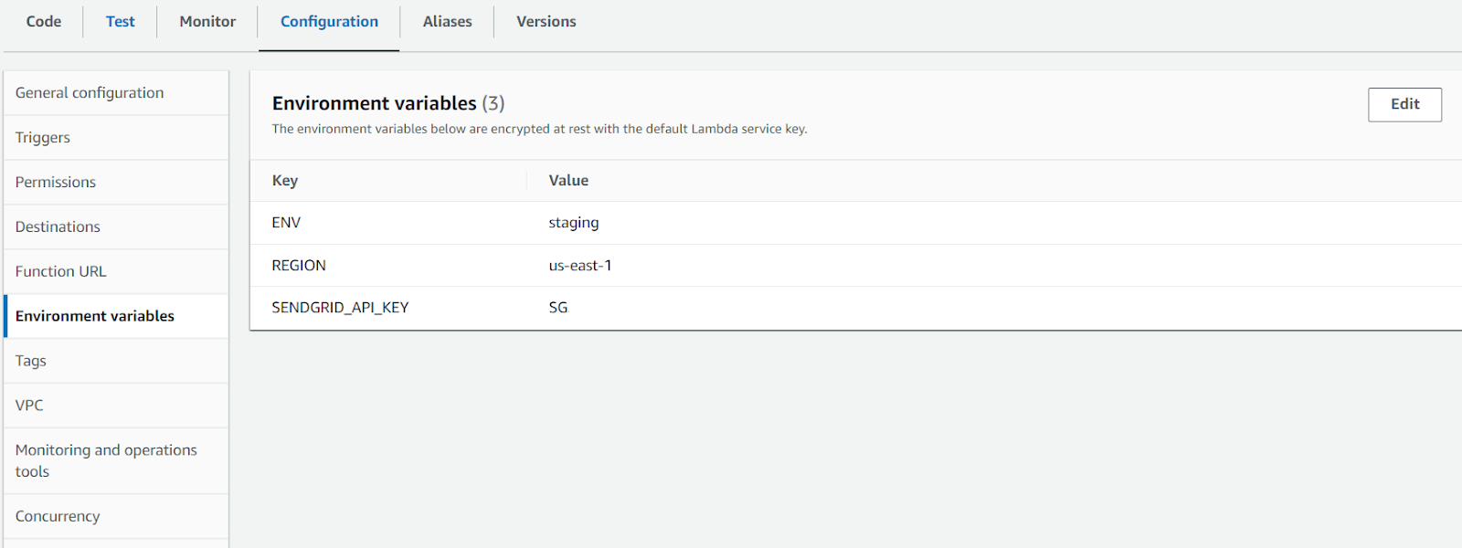 Lambda function environment variable configuration screen, with the variable SENDGRID_API_KEY added with the value of lla