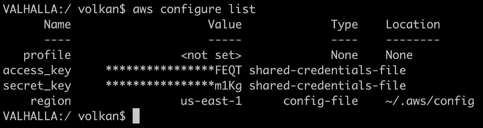 Terminal window showing the details of the AWS account configured in the previous steps. Profile: not set, access_key: partially masked, secret_key: partially masked, region: us-east-1.