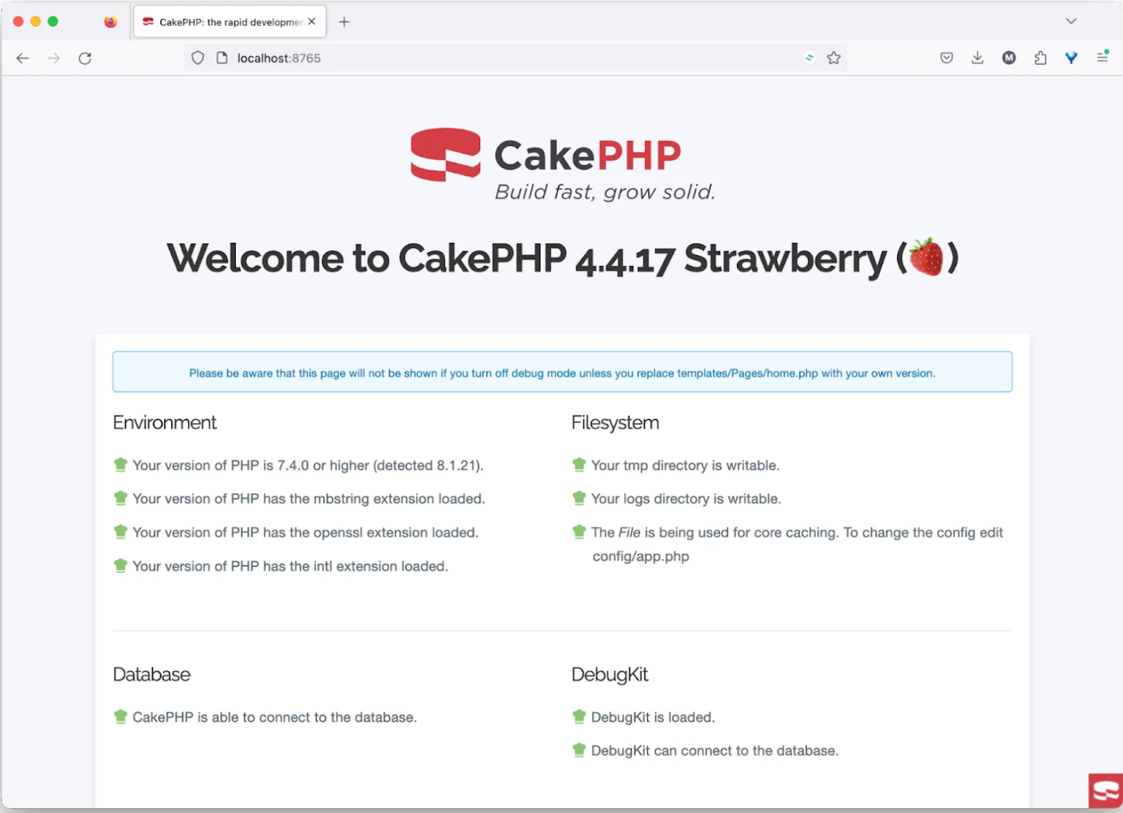 The default home page of a CakePHP application running in Firefox on macOS. It shows the top part of the page, where all of the required prerequisites for running CakePHP are met by the installation.