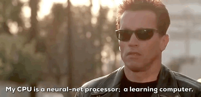 T-800 from the movie Terminator 2: Judgement Day explaining that his CPU is a neural net processor is a learning computer and that he learns from humans as he has contact with them while John Connor touches his face in disbelief.