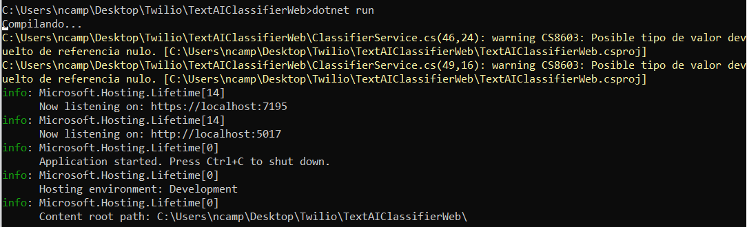 Command line with the result of executing the "dotnet run" command to initialize the web app, obtaining the URL in http and https.