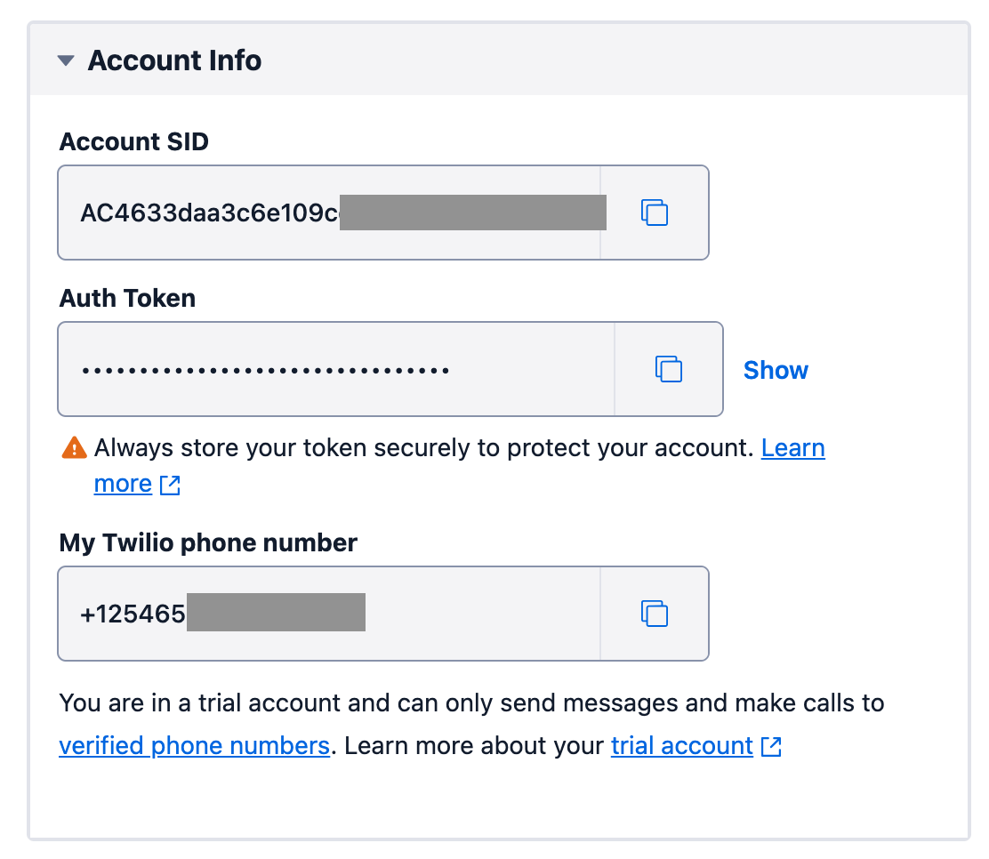 The Account Info panel of the Twilio console dashboard, with part of the Account SID and My Twilio phone number fields redacted.