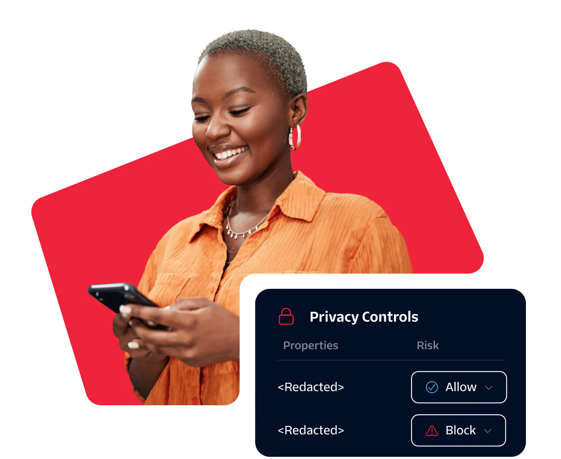 Smiling woman looking at her phone with privacy control options displayed on the screen.