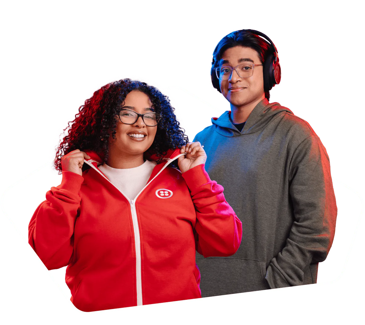 A woman in a red hoodie and a man in a gray hoodie, both smiling.