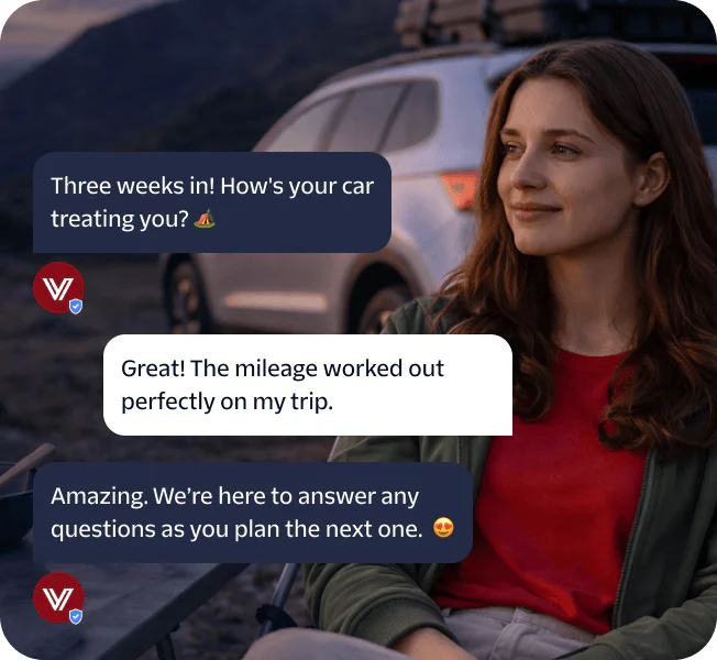 Woman sitting near car with customer service text messages about car's performance.