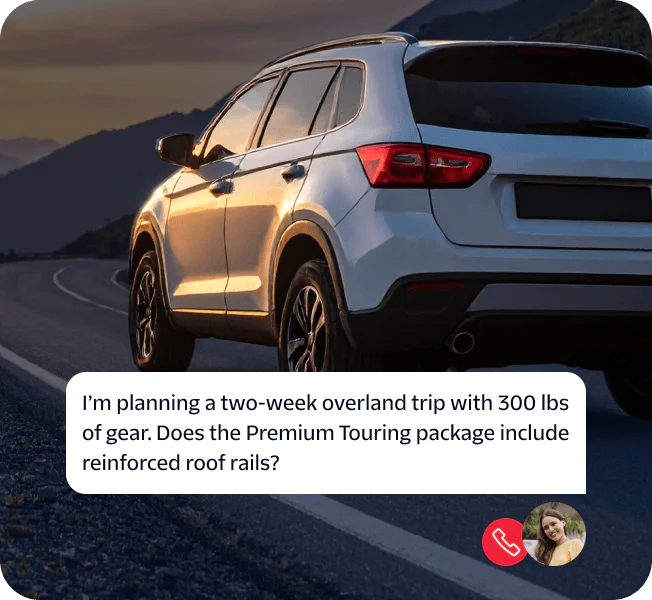 SUV on winding road at dusk with a woman's chat bubble asking about reinforced roof rails.