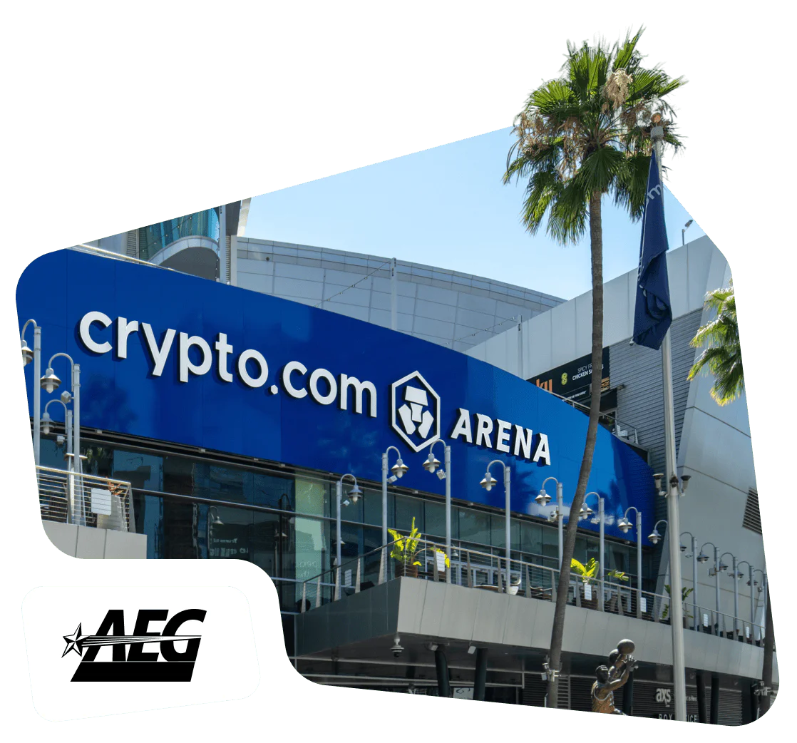 Front entrance of Crypto.com Arena with signage and palm trees.