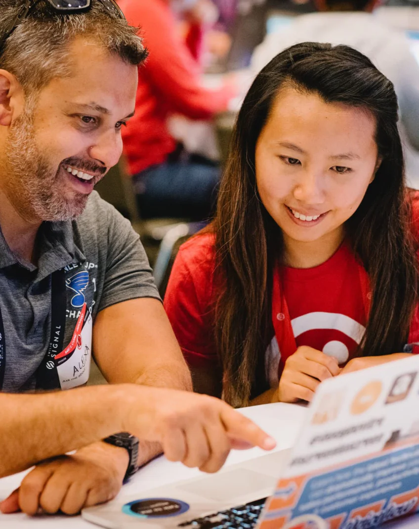 Twilio champion collaborating with a member of the developer community.