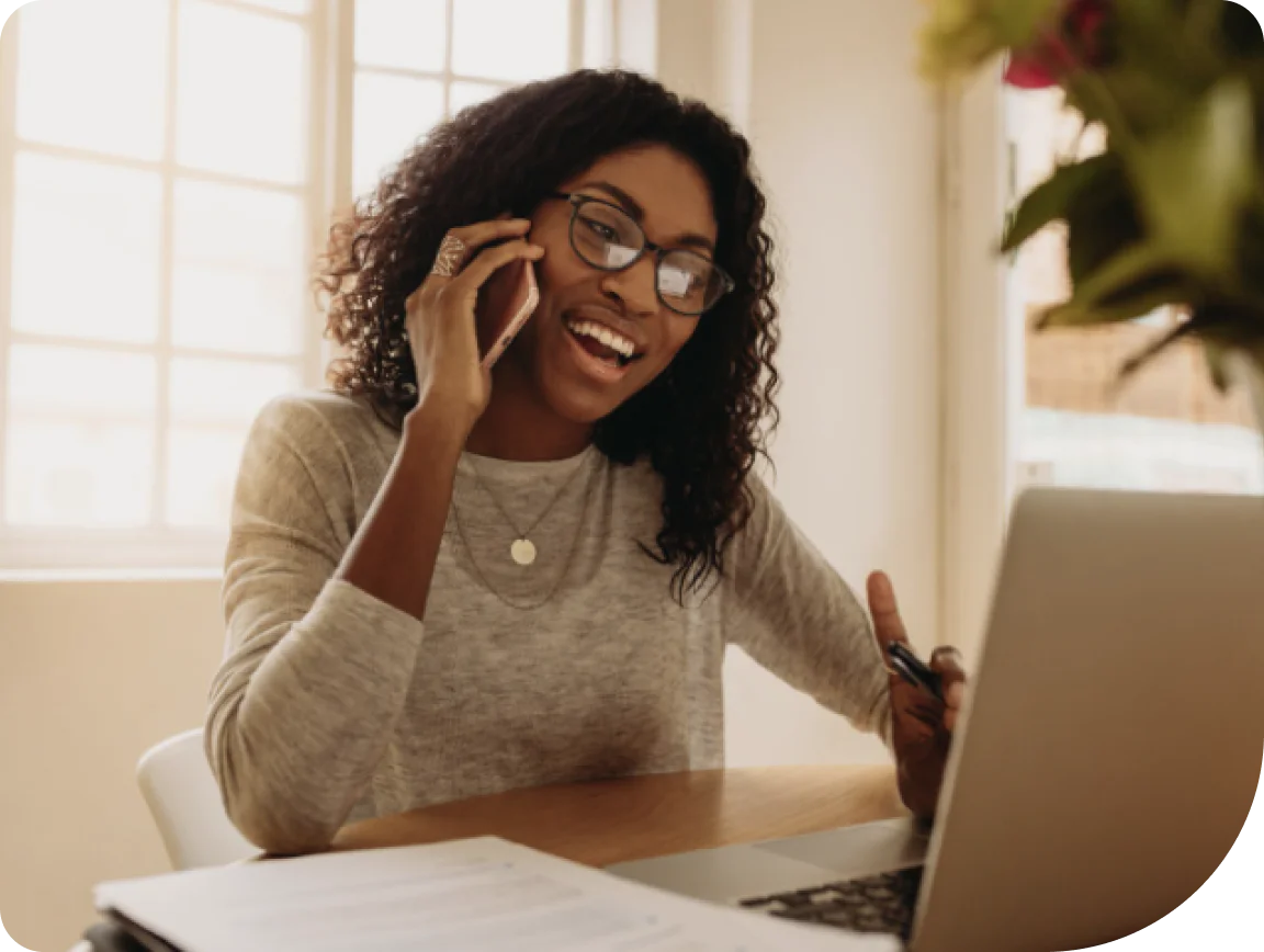 Entrepreneur engaging with a customer through a phone call.