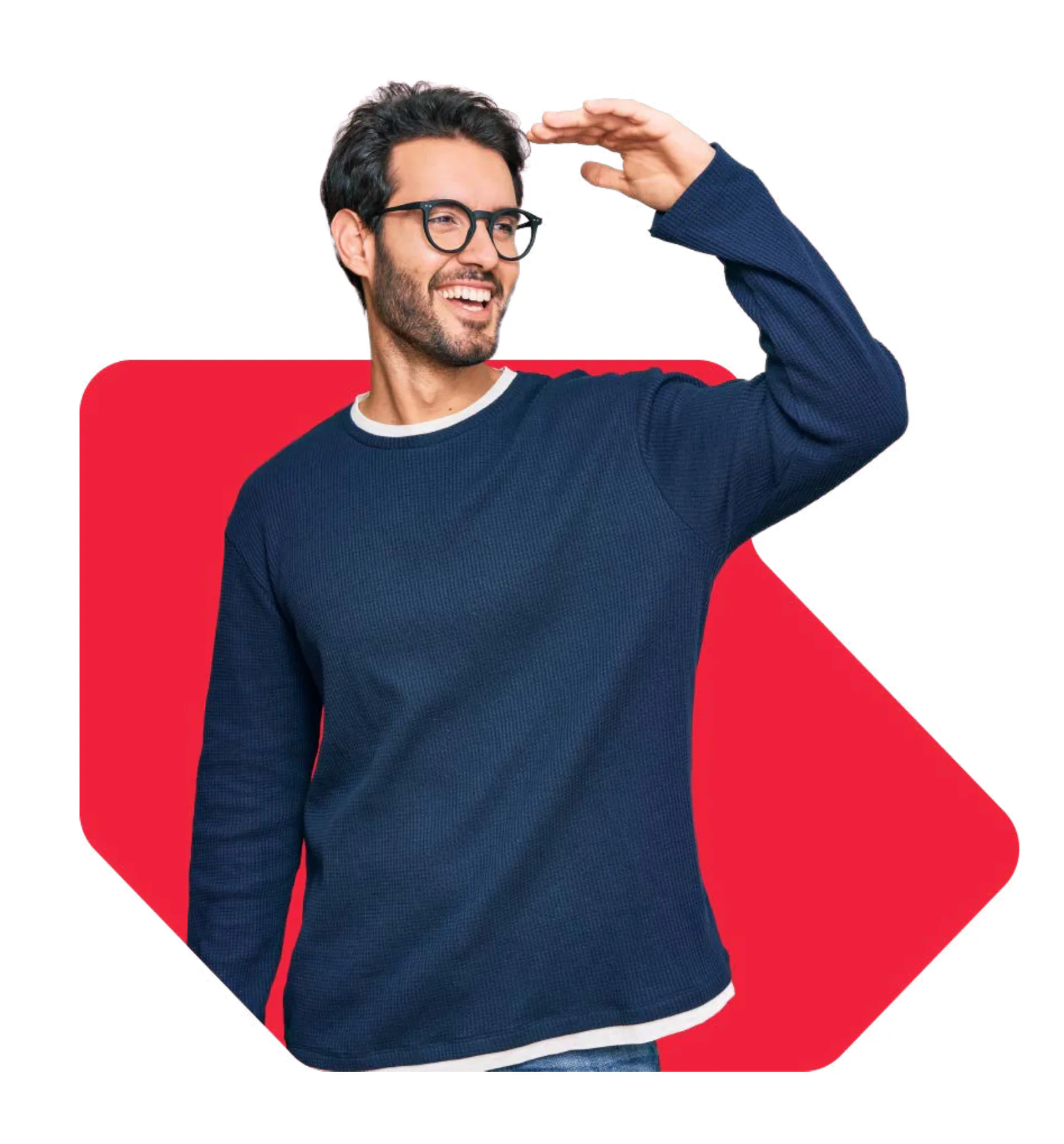 Man wearing glasses and a blue sweater smiles and shields his eyes while looking into the distance.