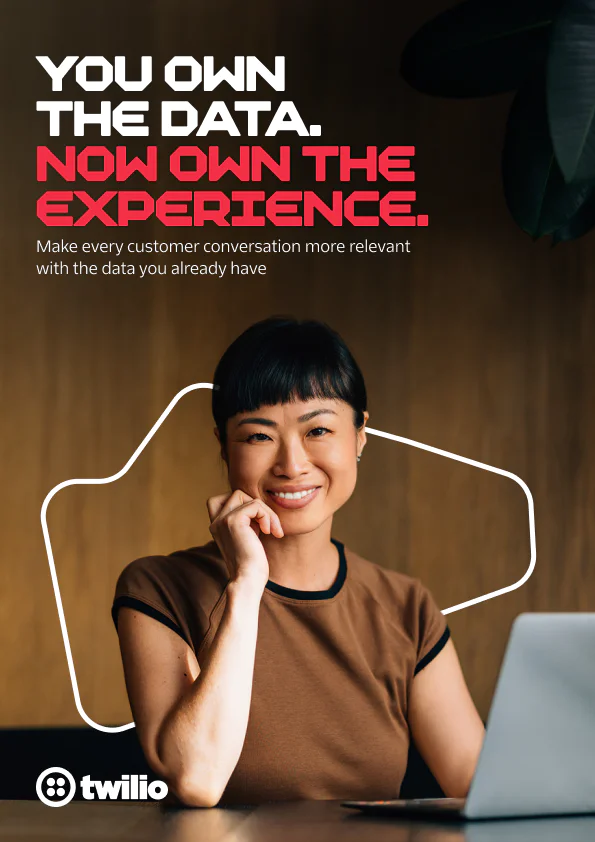 Woman smiling while using a laptop with Twilio logo and text about data and experience.