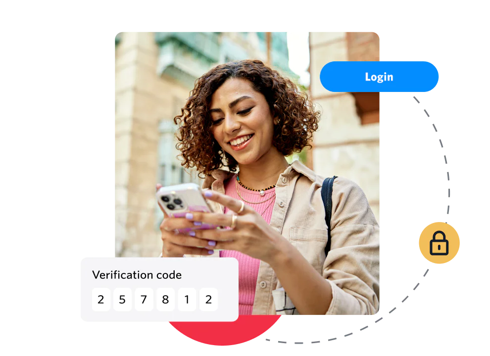 Woman receiving a verification code on her phone for logging in.