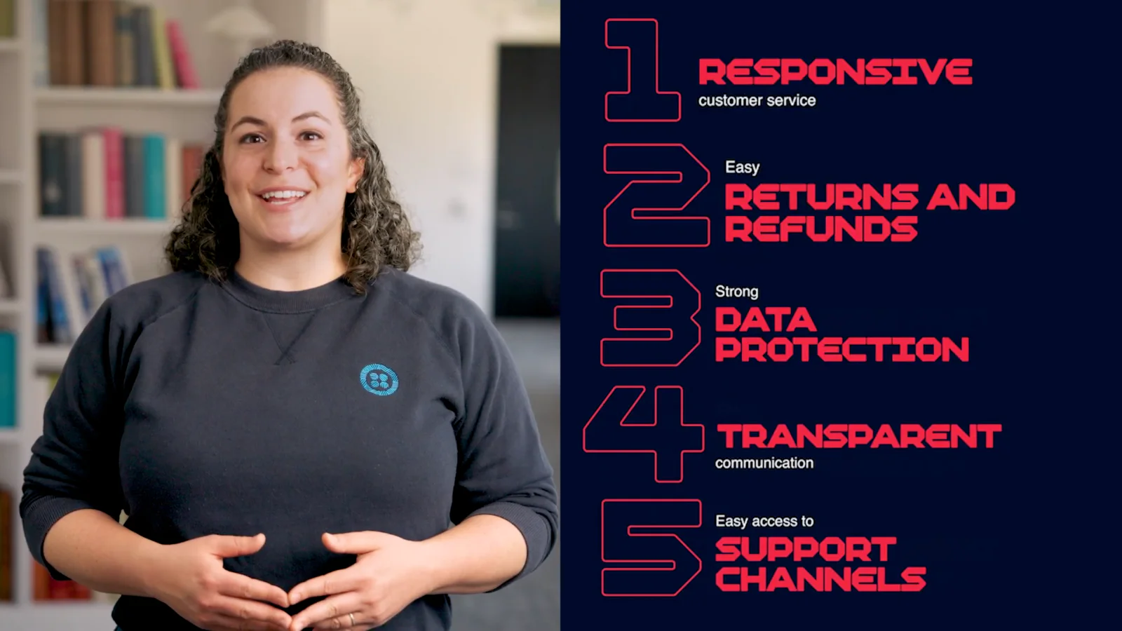 Woman presenting five key customer service elements on a background screen