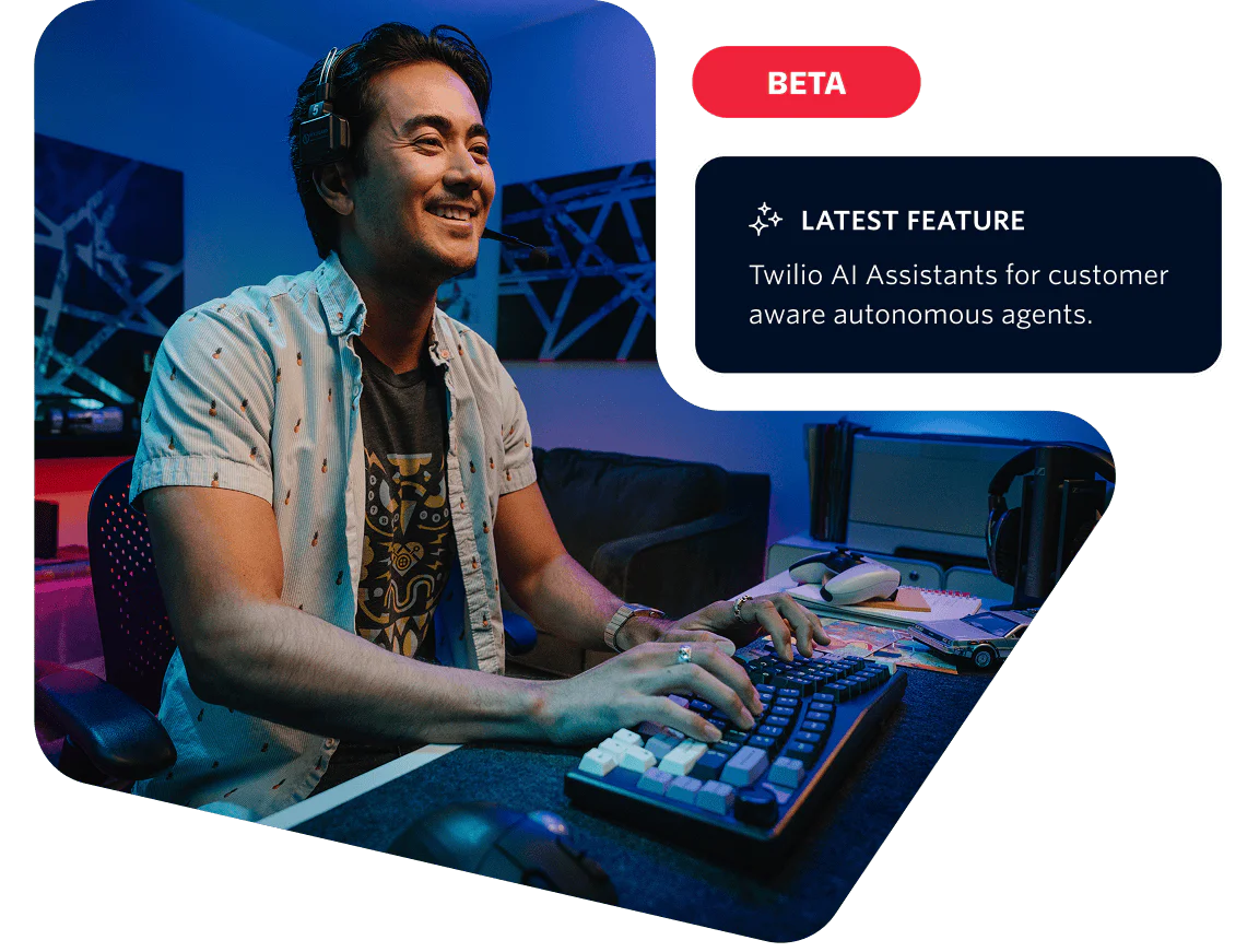 Programmer Testing Twilio AI Assistants Feature A man at a computer desk testing the Twilio AI Assistants feature in a beta environment.