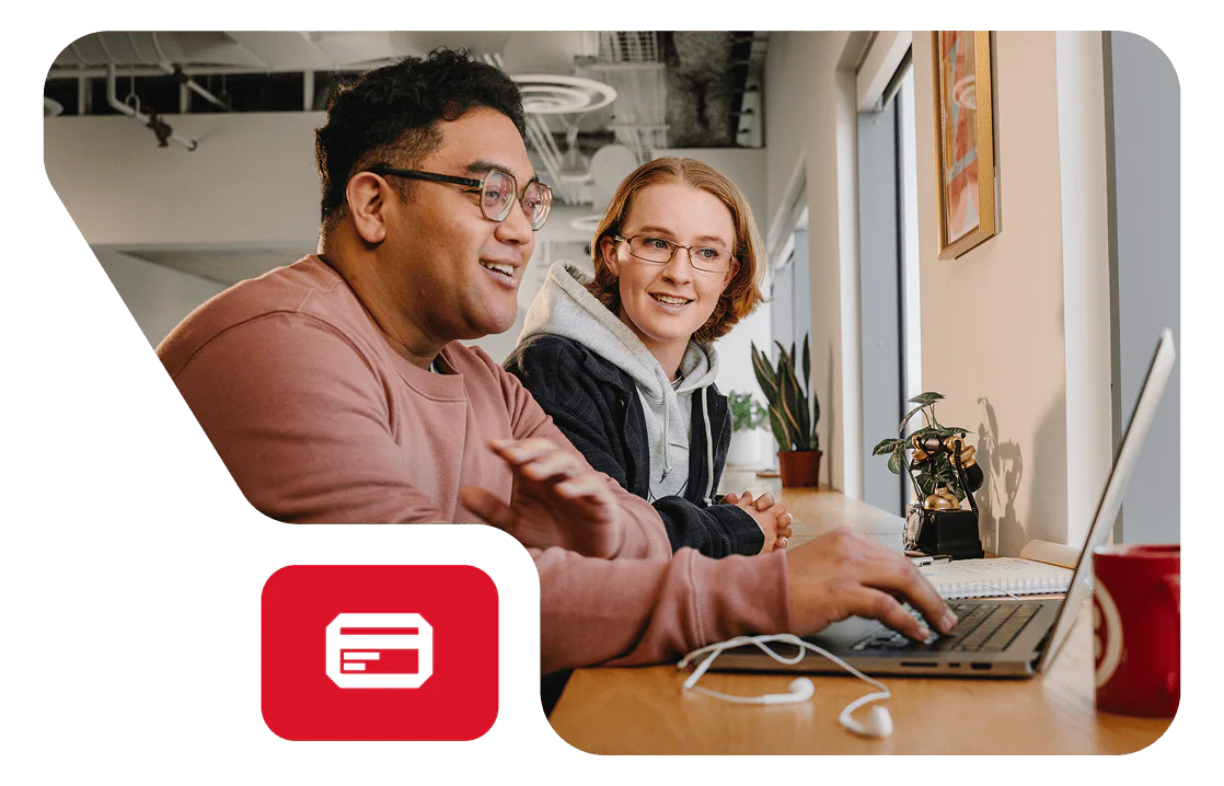 Programmer Testing Twilio AI Assistants Feature A man at a computer desk testing the Twilio AI Assistants feature in a beta environment.