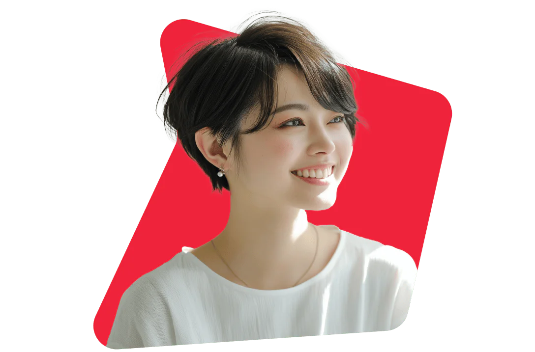 Smiling Woman with Short Hair against a Red Background Smiling woman with short dark hair wearing a white top and earrings, set against a red background.