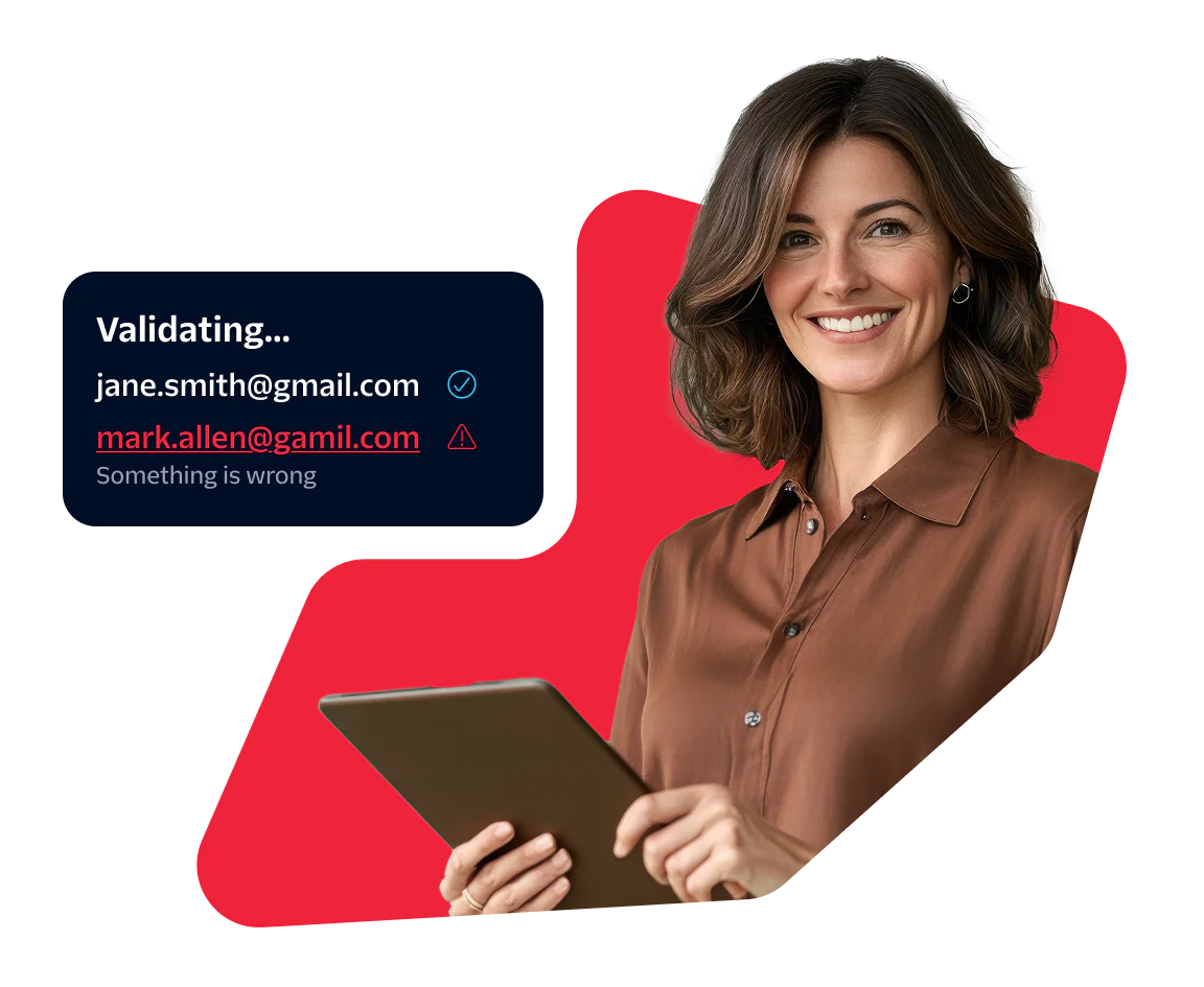 Woman using a tablet while validating email addresses Woman holding a tablet with a screen showing email validation results