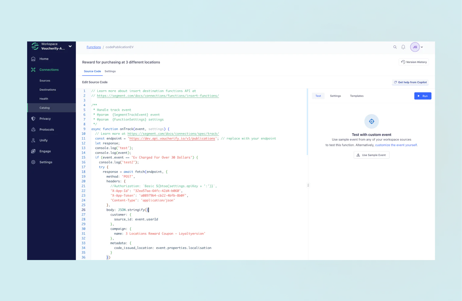 JavaScript code for reward events is displayed in a code editor within a web application interface