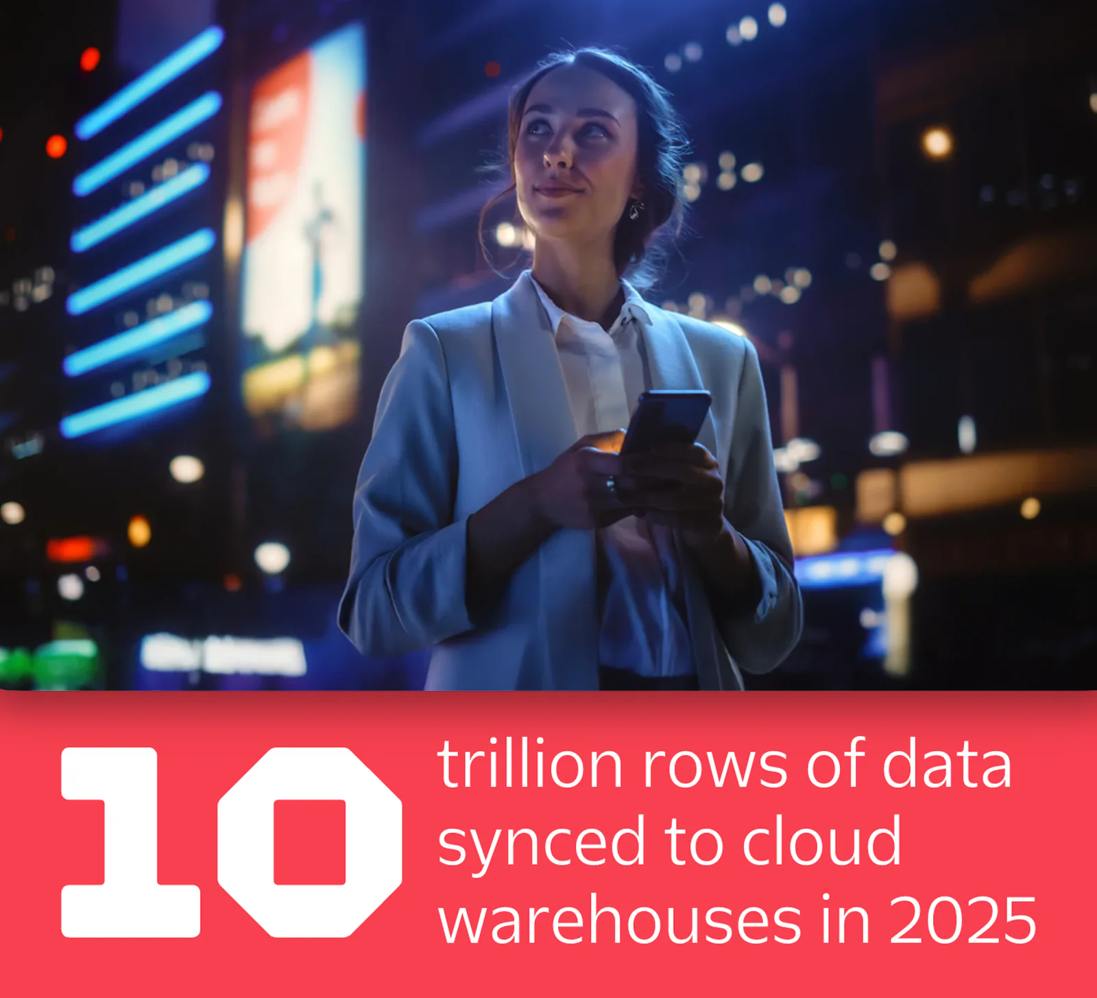 Woman in suit holding phone in city at night with text 10 trillion rows of data synced to cloud warehouses in 2025