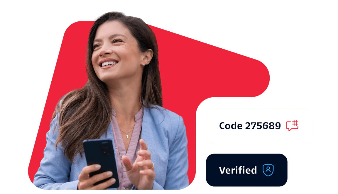 Woman in a blue blazer smiling and holding a phone with a verification code and badge displayed beside her.