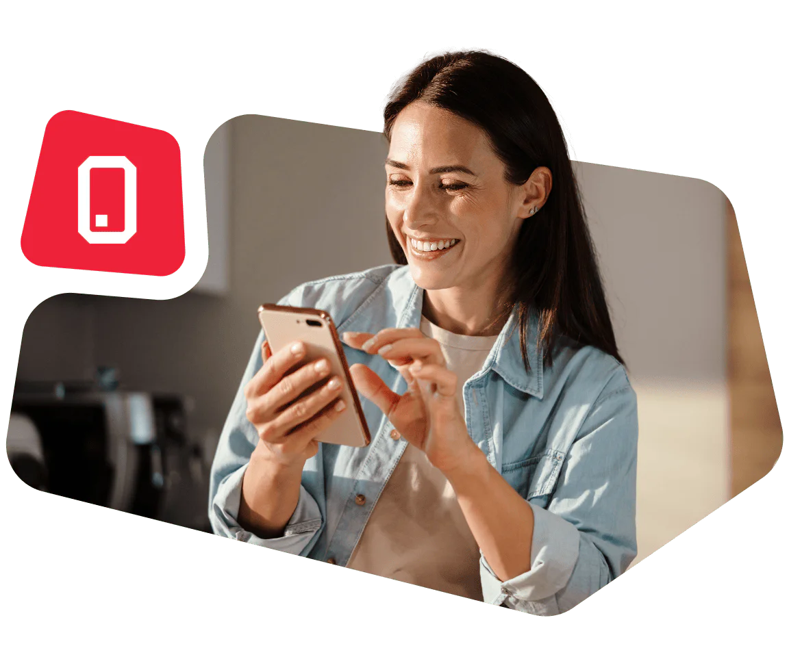 Woman smiling and looking at her smartphone