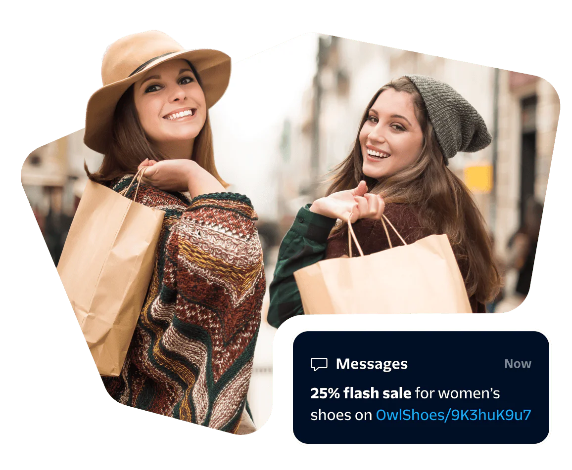 Two smiling women shopping with discount offer pop-up for women's shoes.
