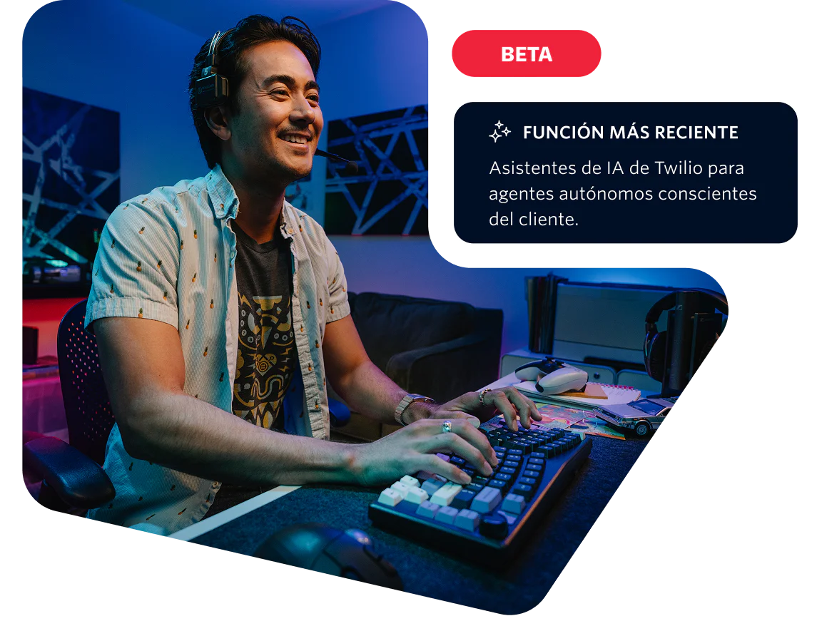 A man at a computer desk testing the Twilio AI Assistants feature in a beta environment.