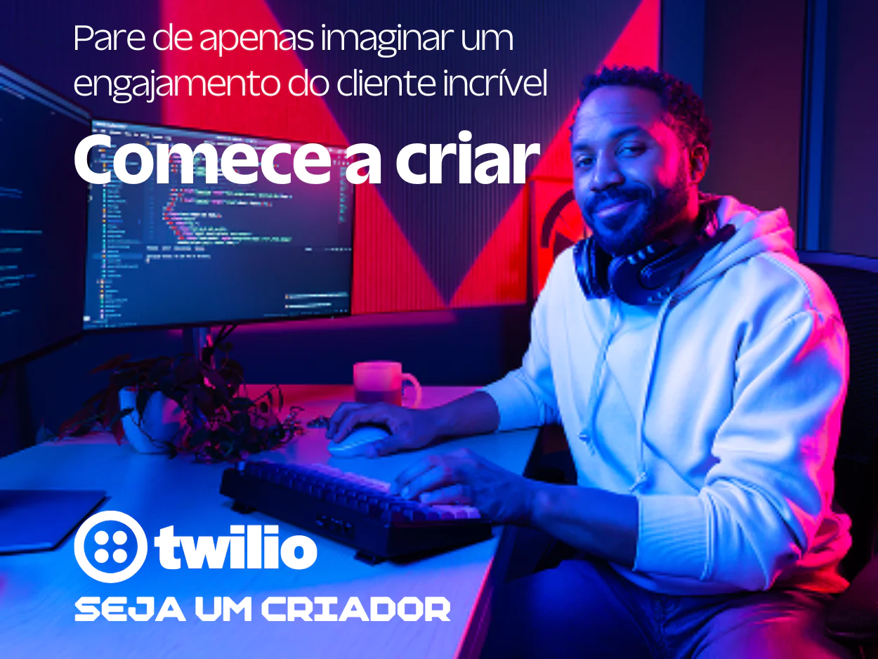 Developer Desk with Twilio Advertisement A content creator in a hoodie sits at a desk with dual monitors and Twilio branding.