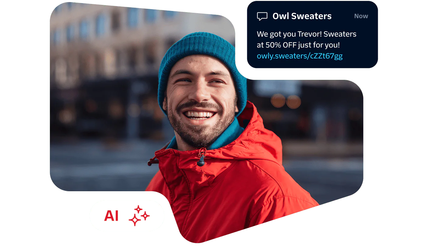 Smiling man received discount notification Man in red jacket and blue beanie smiling with a discount notification from Owl Sweaters.